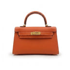 Ikara structured vegan leather work bag in Marrakech Orange